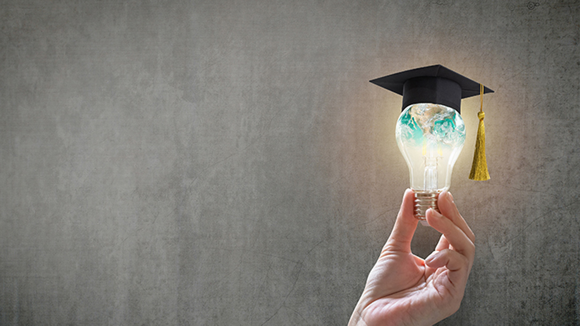 Photo holding a light bulb