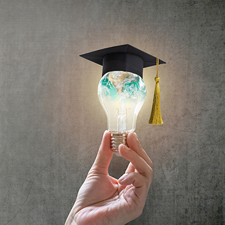 Photo holding a light bulb