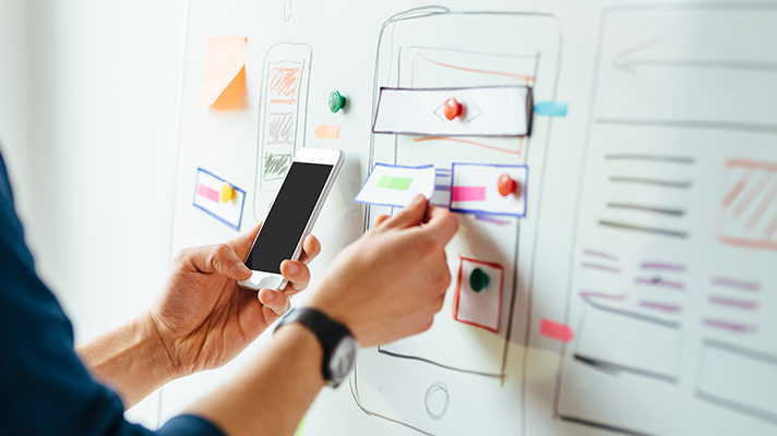 image of a person holding a cell phone