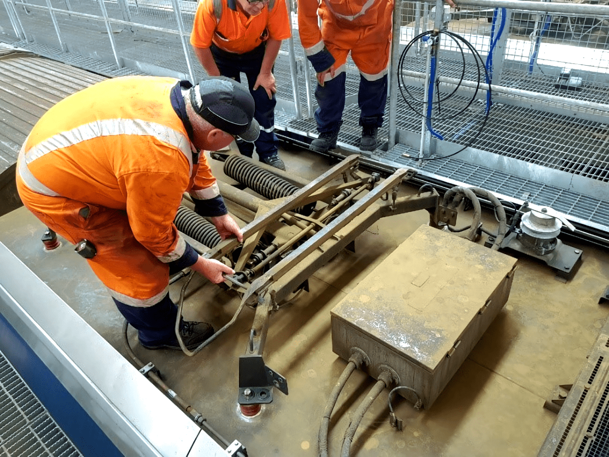 Workers are checking the train