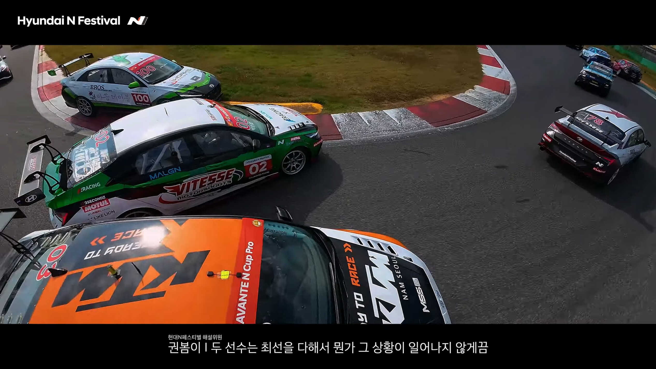 Race cars involved in an accident at a corner