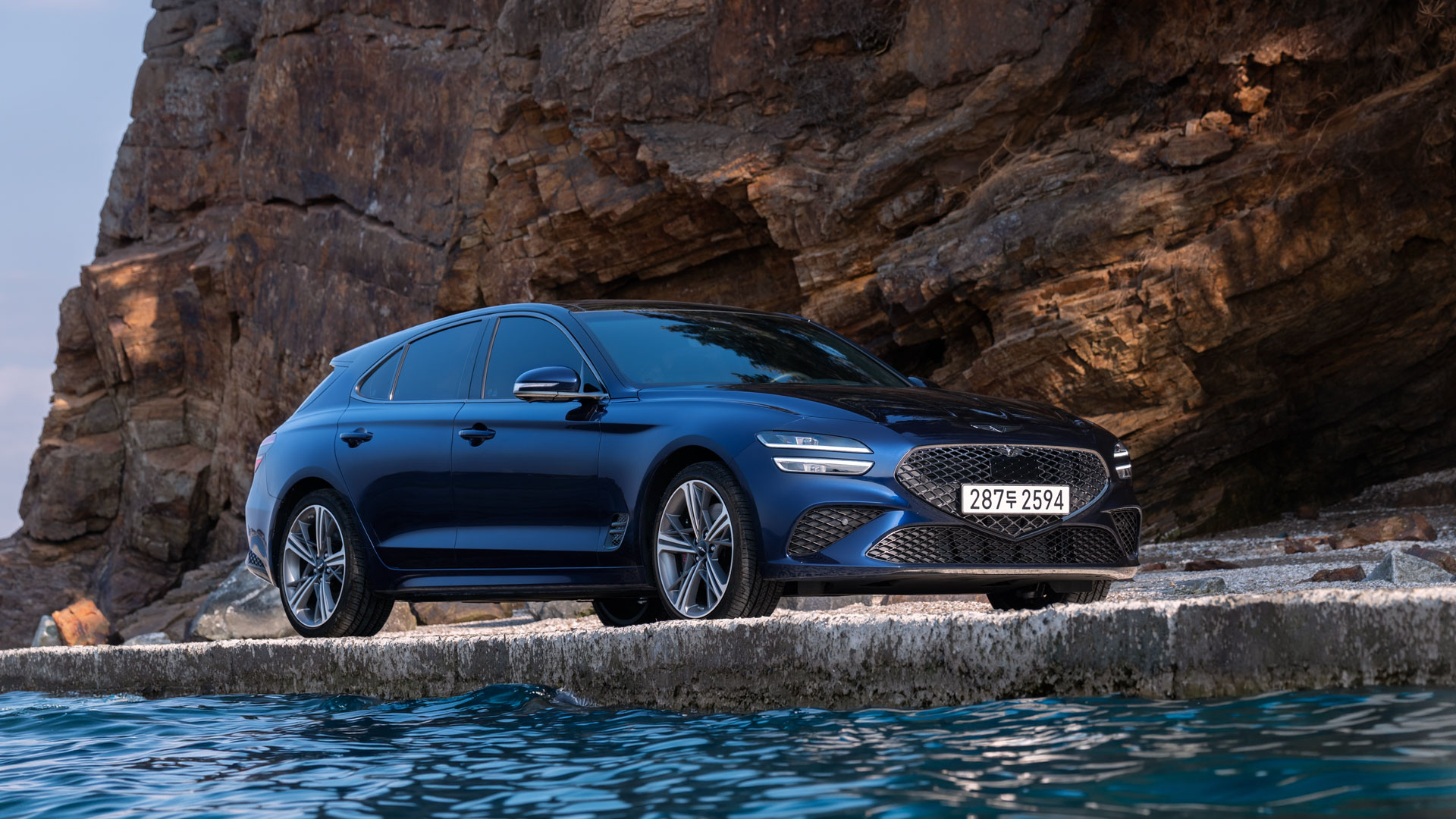 Genesis G70 Shooting Brake delivers a refined driving experience, framed by coastal scenery and endless horizons. - main