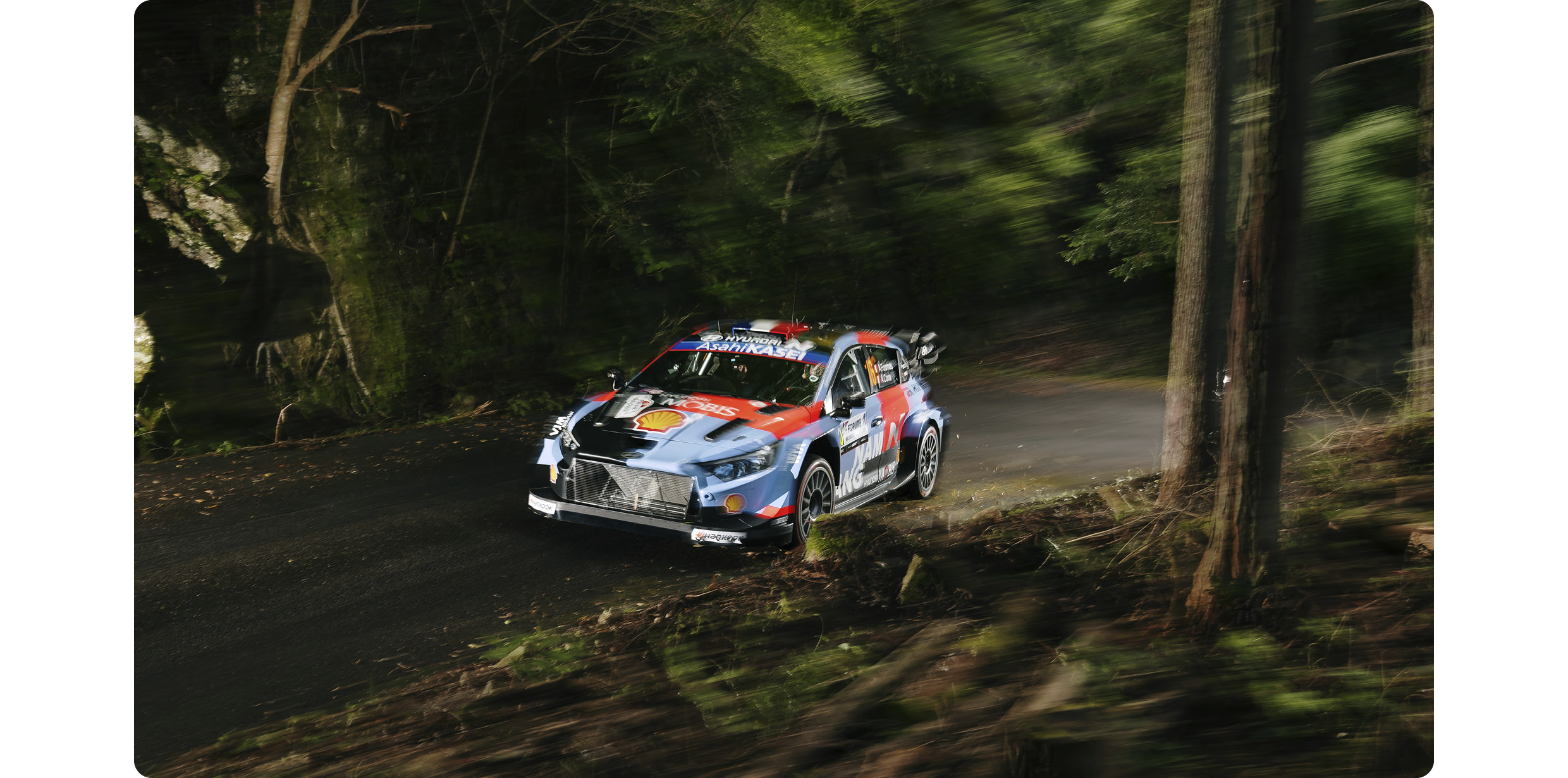 The Hyundai team WRC1 rally car is on the road