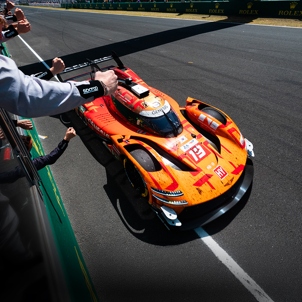Genesis hypercar receiving the checkered flag at the 24 Hours of Le Mans