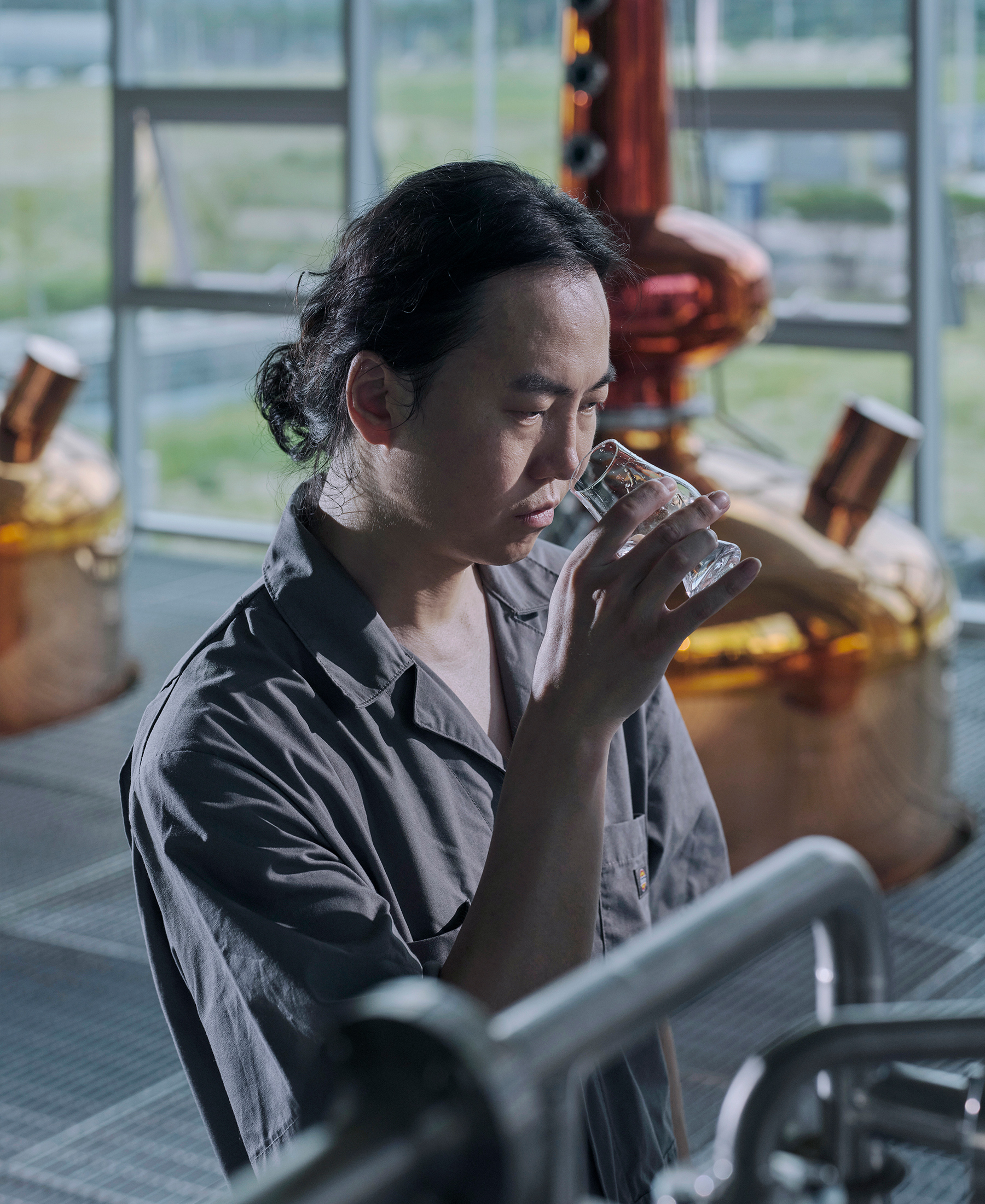 CEO Changsoo Kim smelling the whisky's aroma